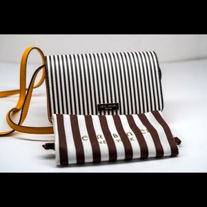 Henri Bendel yellow wallets for women